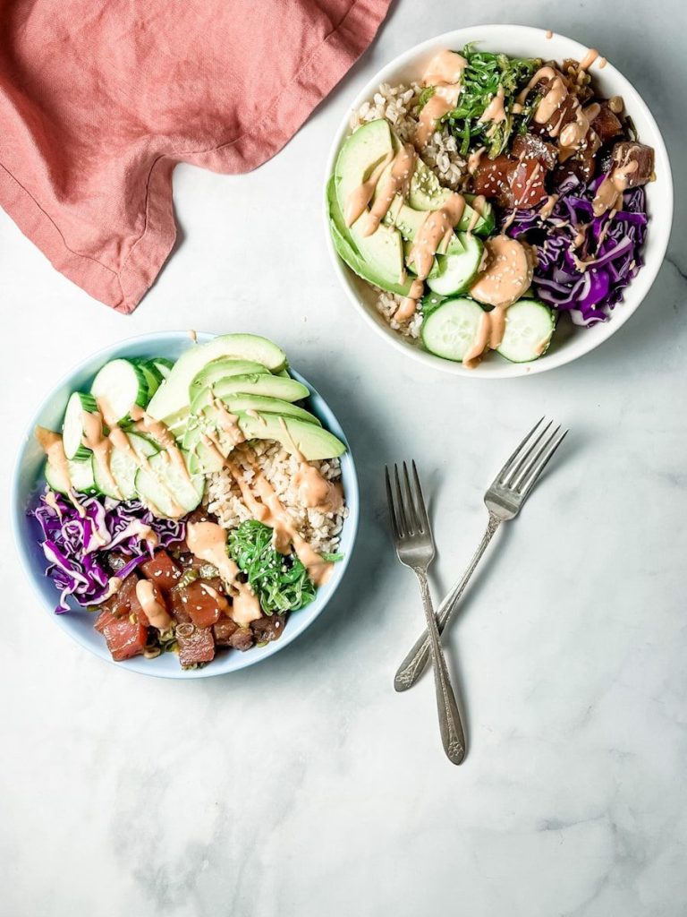 two bowls of food are sitting on a table. meal-prep ideas