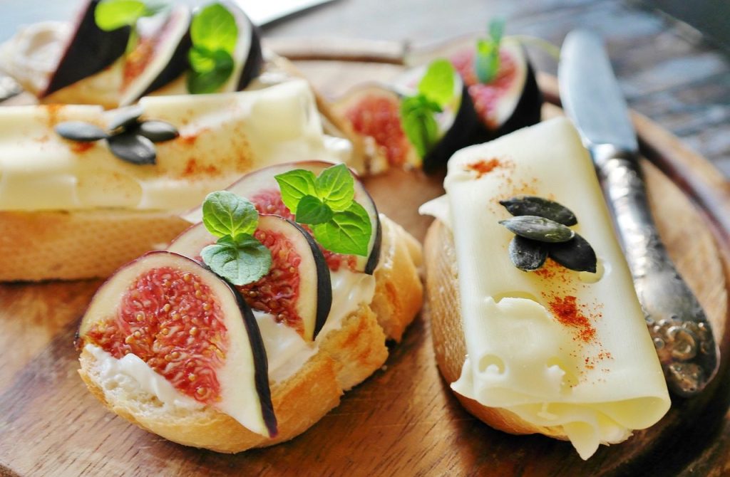 Celebrating New Year’s Eve Alone: Your Can't Miss Itinerary 1 fig, cheese, bread. celebrating new year's even alone