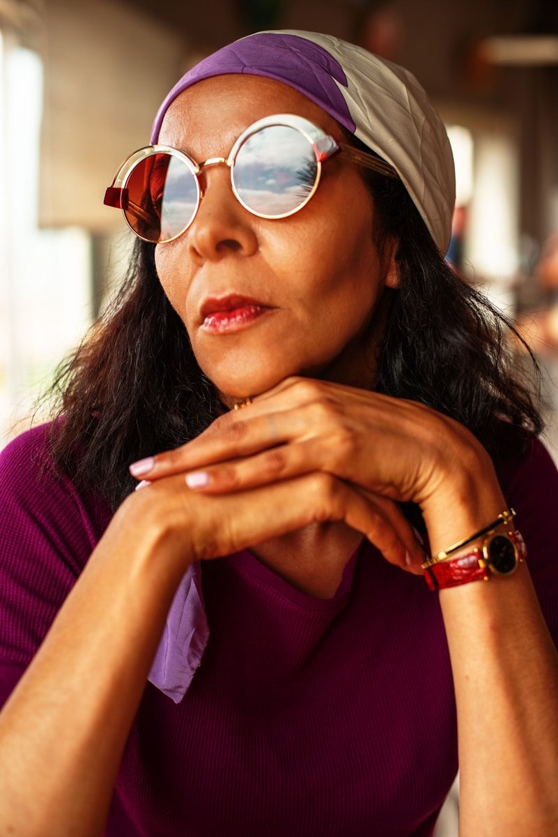 a woman wearing glasses. menopause symptoms